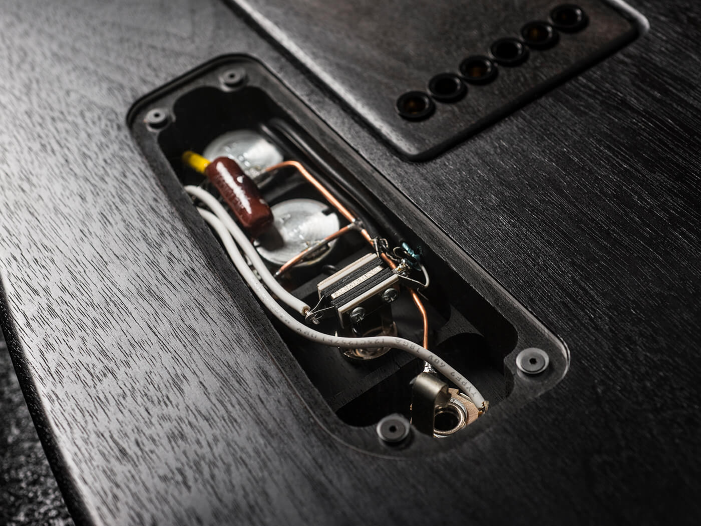 I want to replace my guitar's wiring, would it make a difference?