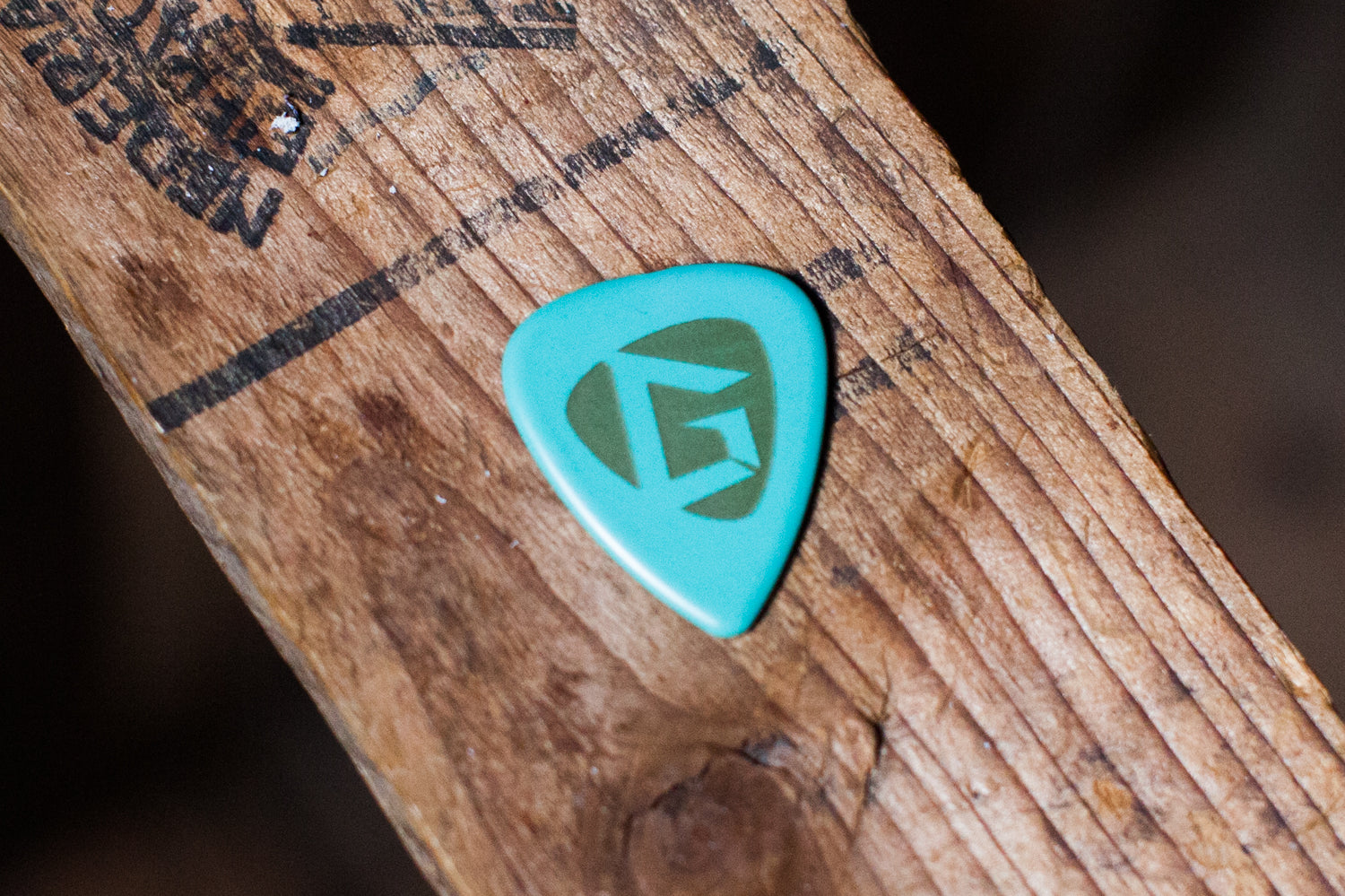Gravity Pickups Gold Series rear etching sea foam green guitar pick