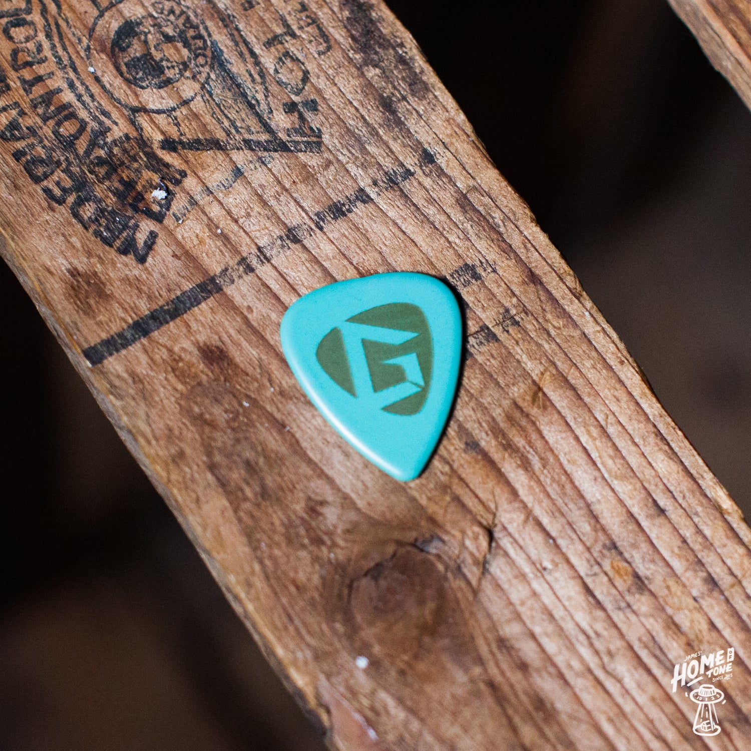 Gravity Pickups Gold Series rear etching sea foam green guitar pick