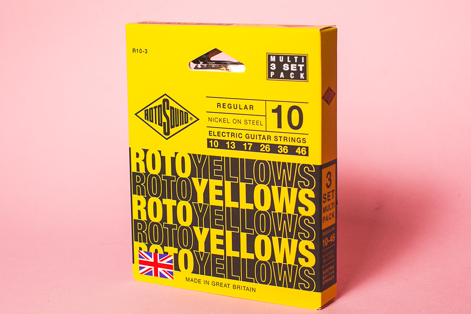Rotosound Roto Yellow guitar string set packaging on a pink background