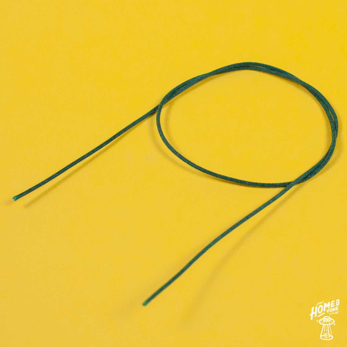 A reel of Gavitt USA 22awg cloth covered wire in green