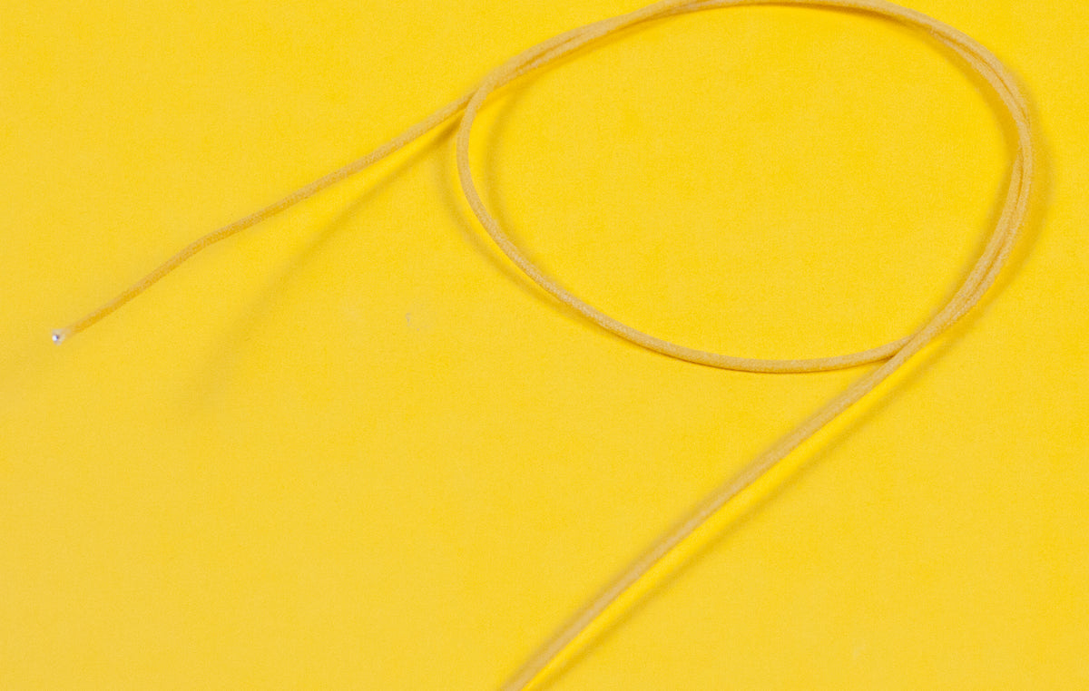 A reel of Gavitt USA 22awg cloth covered wire in yellow