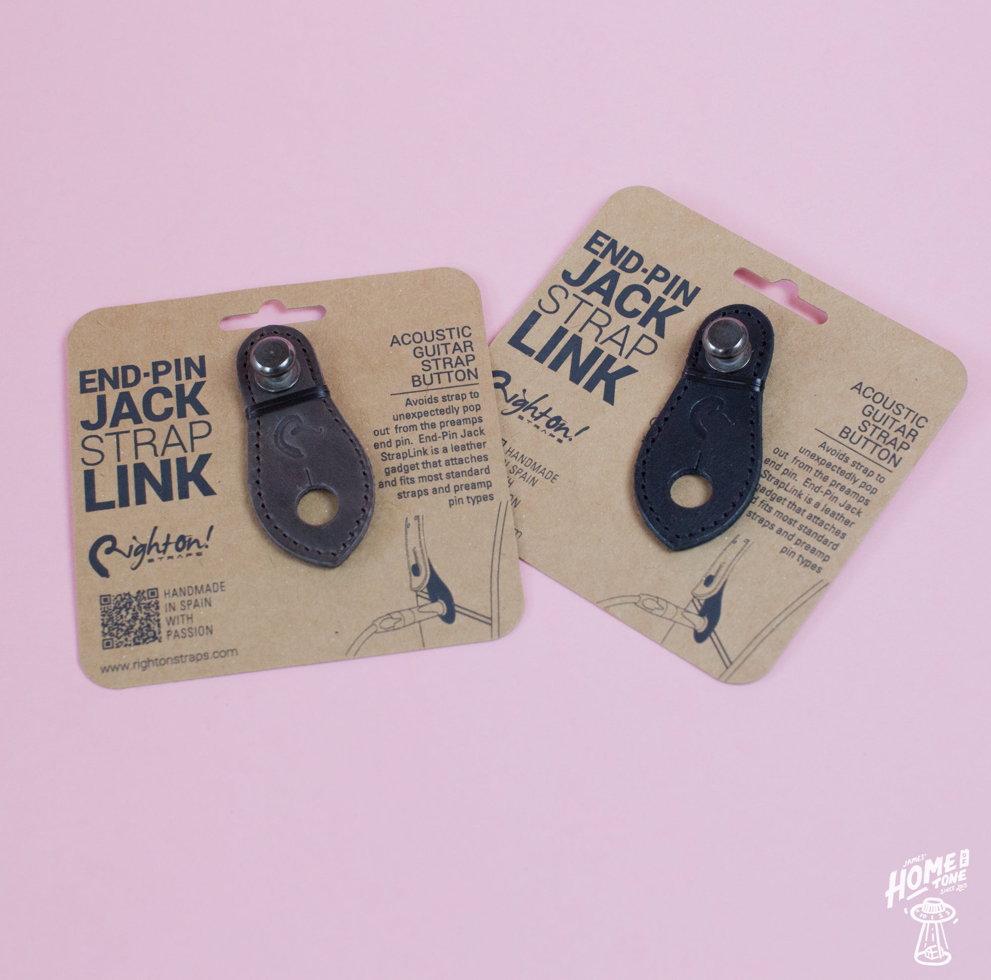 Two leather end-pin jack strap links on cardboard packaging, one brown and one black, with branding and product information.