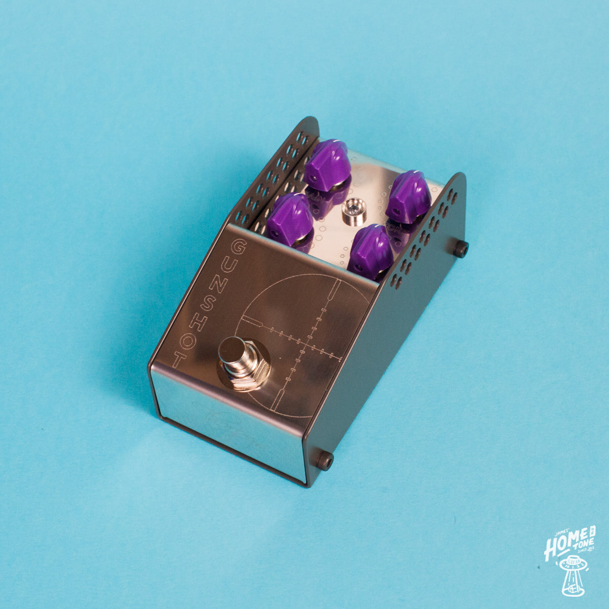 A ThorpyFX GUNSHOT overdrive pedal with silver metal finish and purple knobs, designed for use with guitar