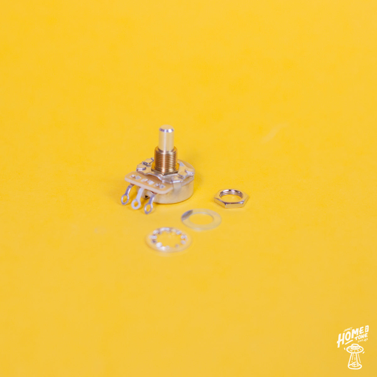 Mechanical potentiometer with washers on a yellow background