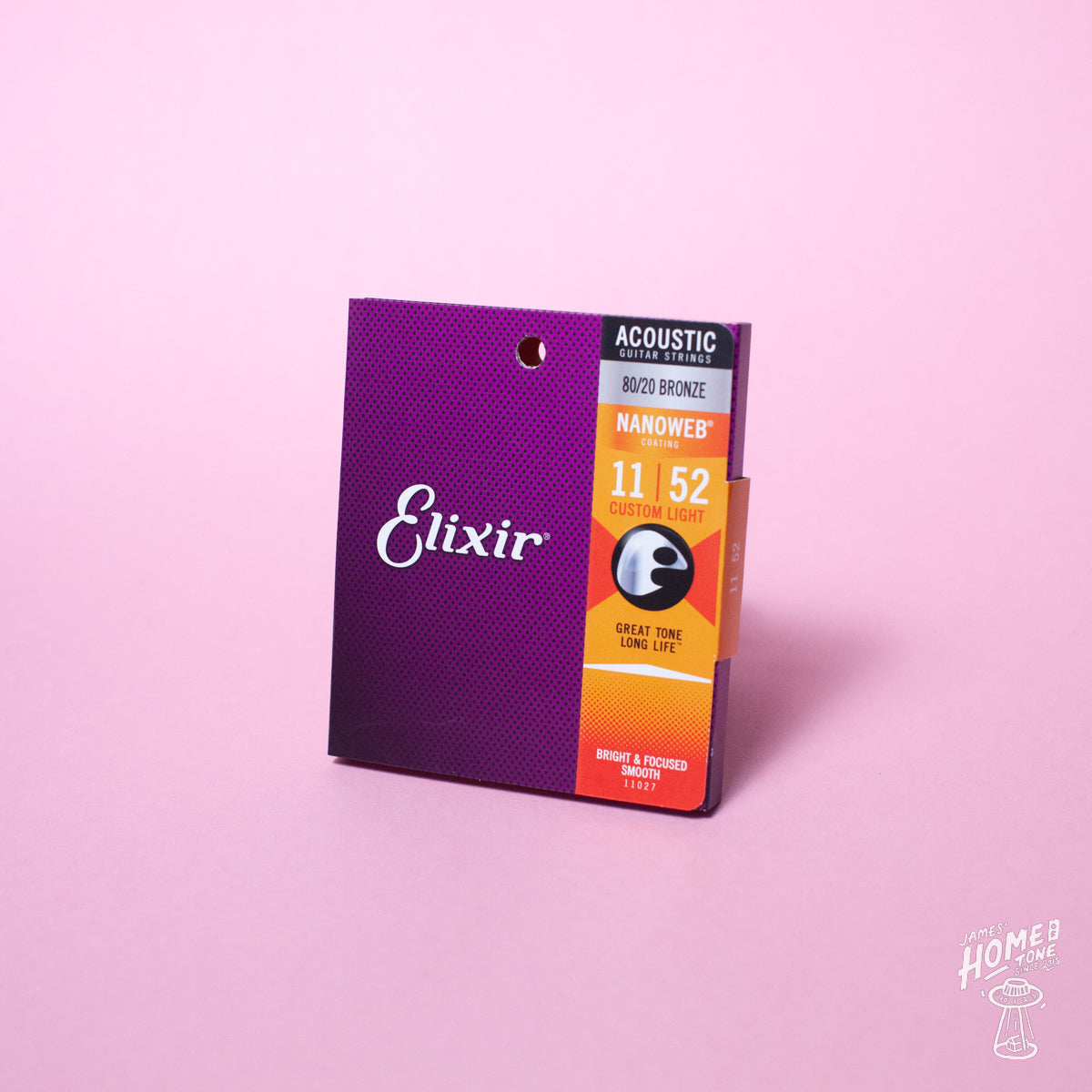 A pack of Elixir Nanoweb coated 80/20 bronze acoustic guitar strings with gauges displayed on the packaging.