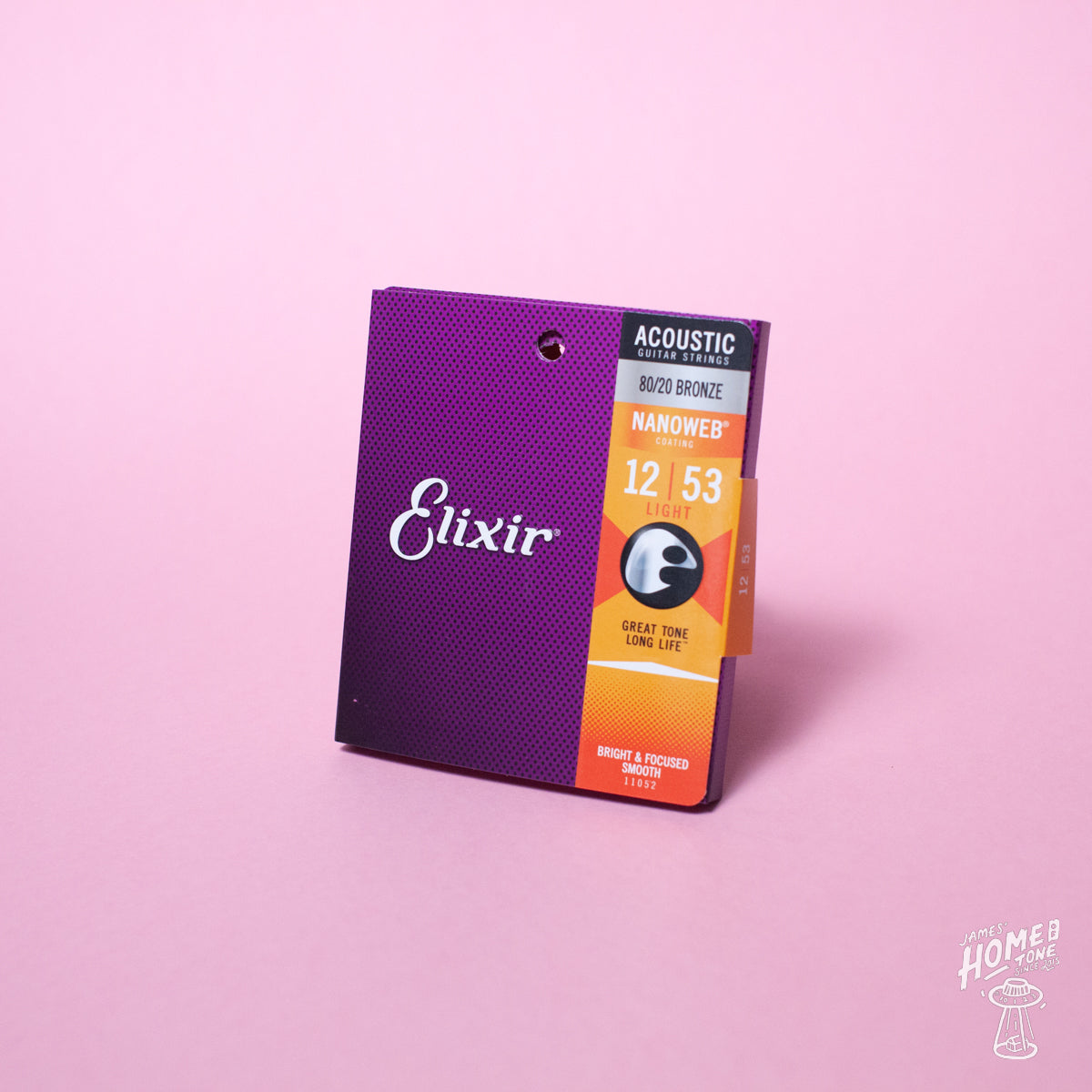 A pack of Elixir Nanoweb coated 80/20 bronze acoustic guitar strings with gauges displayed on the packaging.