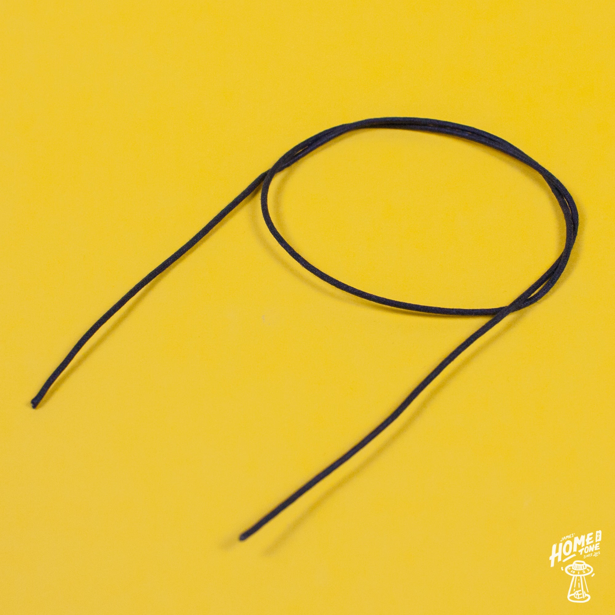 A reel of Gavitt USA 22awg cloth covered wire in black