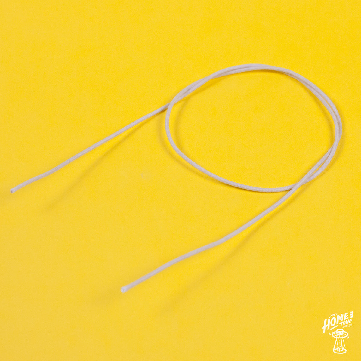 A reel of Gavitt USA 22awg cloth covered wire in off white