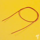A reel of Gavitt USA 22awg cloth covered wire in orange