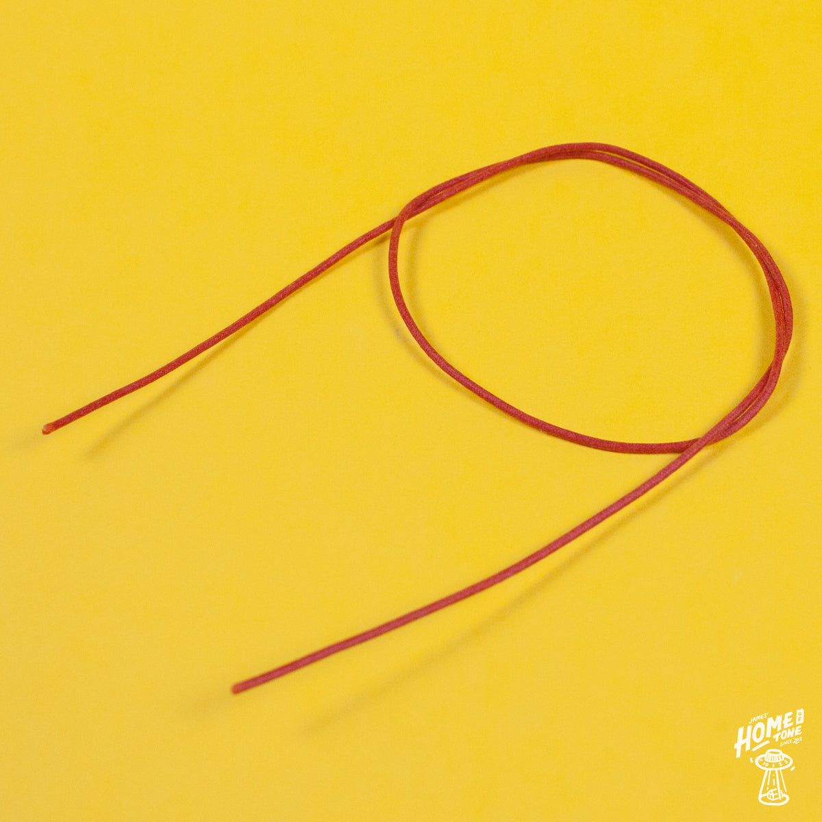 A reel of Gavitt USA 22awg cloth covered wire in orange