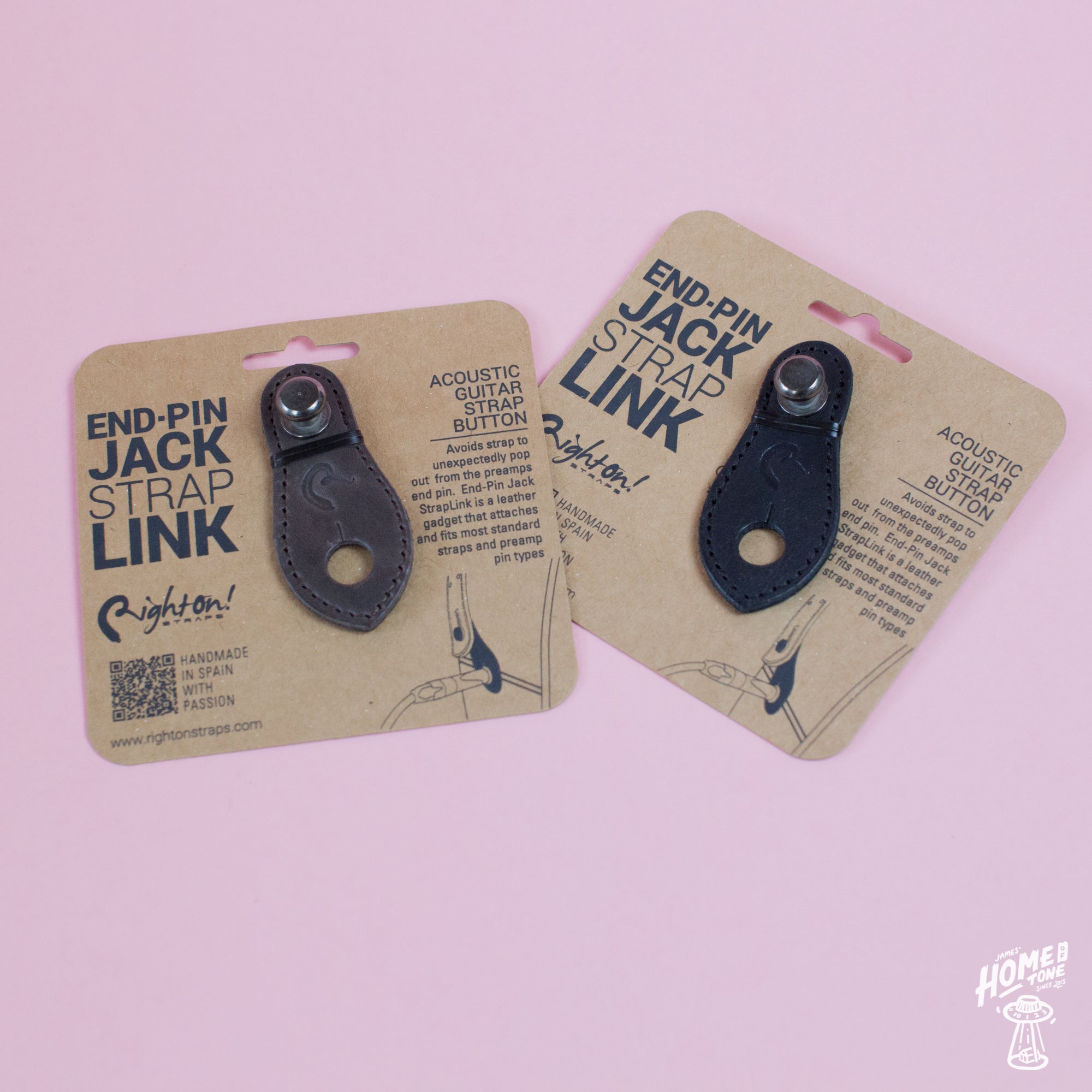 Two leather end-pin jack strap links on cardboard packaging, one brown and one black, with branding and product information.