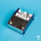 A metal guitar pedal with two knobs and a switch labeled 'DRIVE' and 'BOOST', branded with 'THE DANE' and the ThorpyFX logo.